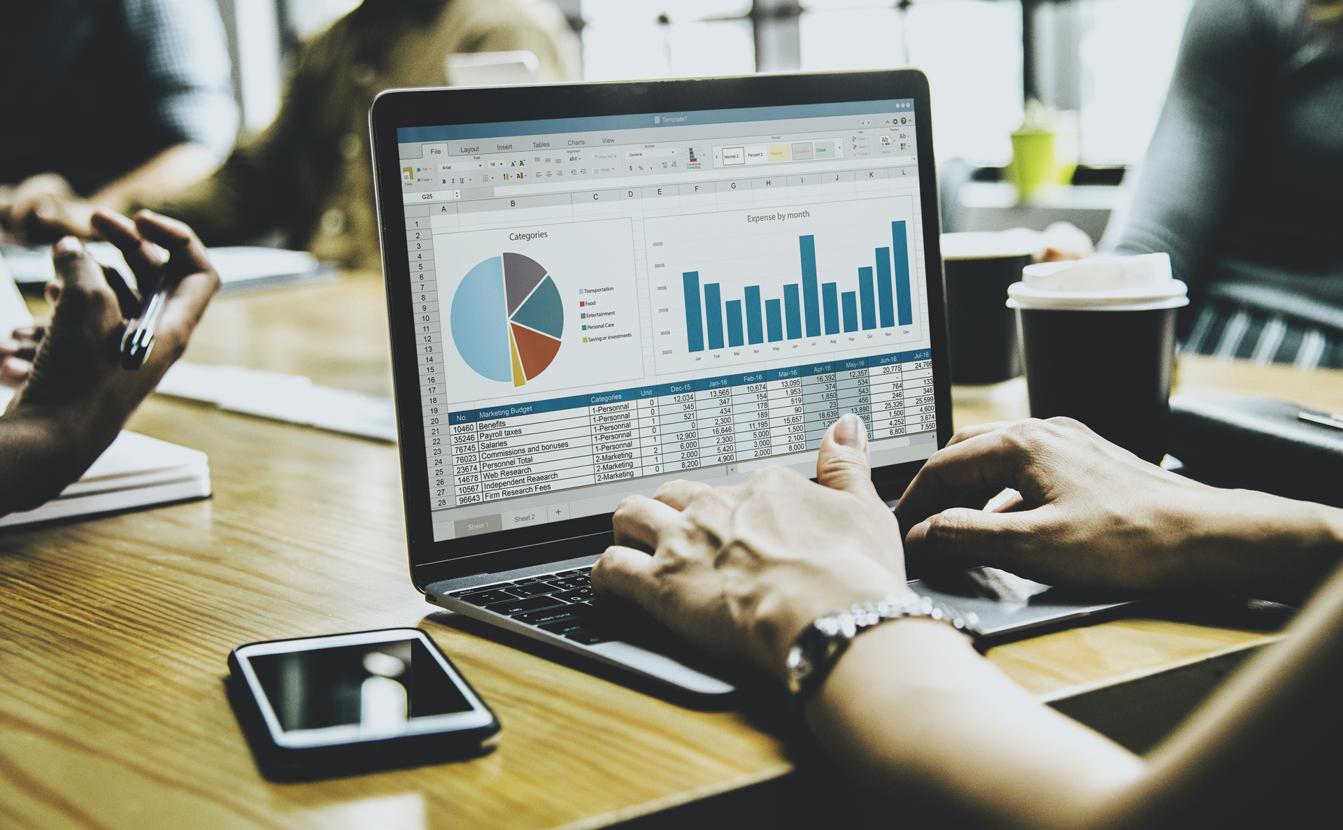 a laptop screen showing graphs and charts